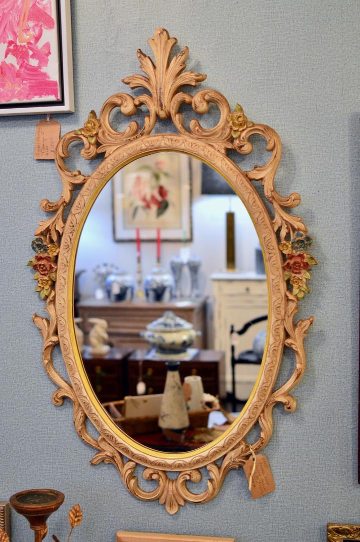 Vintage hand painted oval wood syrocco mirror