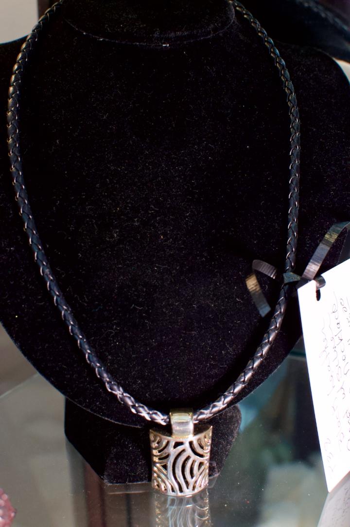 Black leather cord w/ silver charm necklace