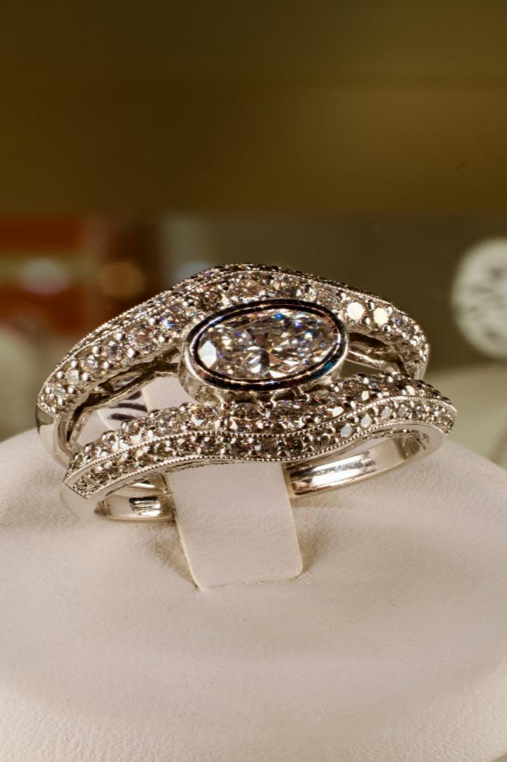 Shop Bezel set oval cut diamond ring | Hunt & Gather