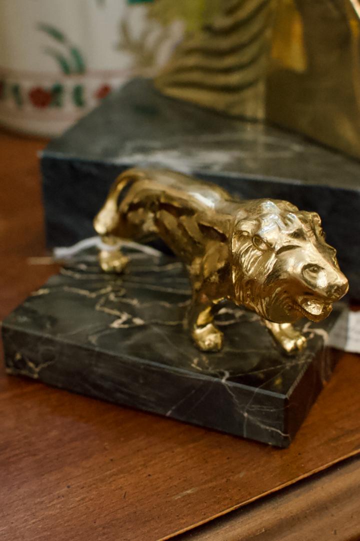 Shop Vintage brass lion on marble base | Hunt & Gather