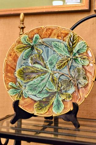 Beautiful mold work & painting Majolica plate. Signed.