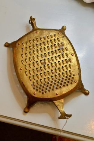 Turtle brass grater on hanger