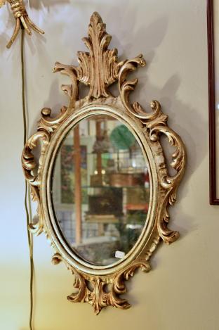 Scroll leaf frame oval mirror