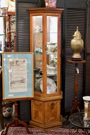 Mirrored, lighted curio cabinet