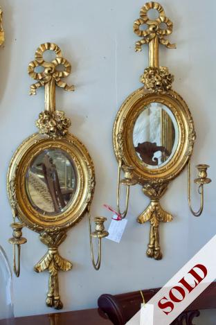 Pair of gold mirror candle sconces