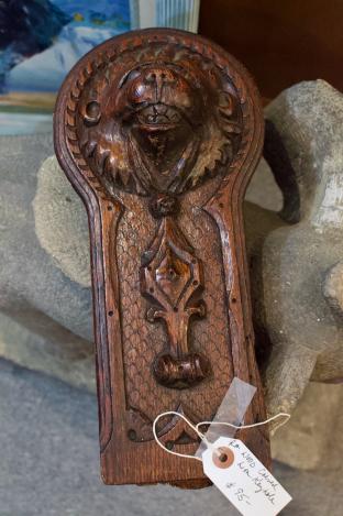 Wood carved lion keyhole