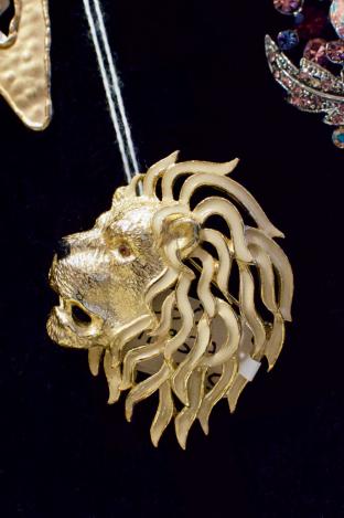 Lion brooch