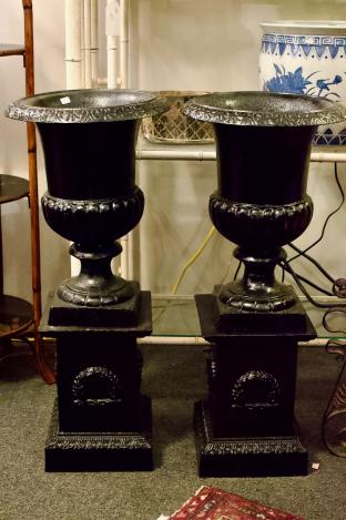 Pair of cast iron pedestal planter urns