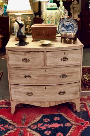 2 over 2 bow front chest of drawers.