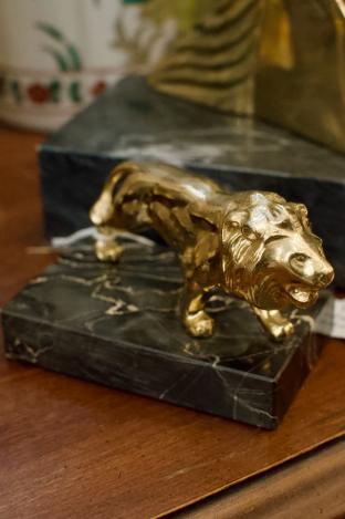 Vintage brass lion on marble base