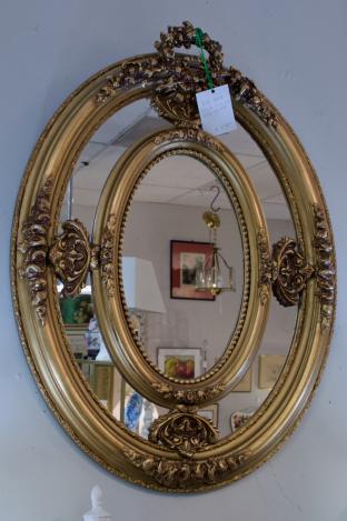 Ornate sectional gold mirror