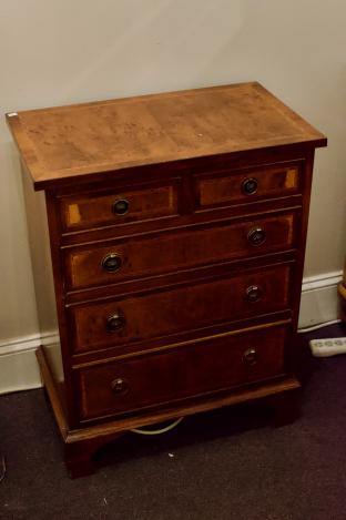 Burled inlaid small chest of drawers