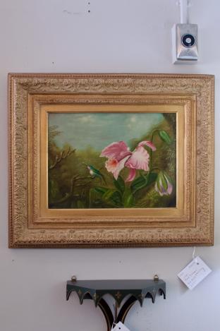Oil on canvas bird w/ flower painting