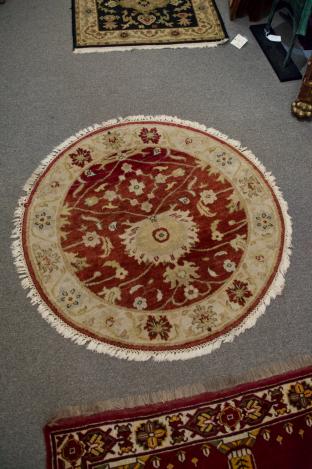 Round hand knotted rug