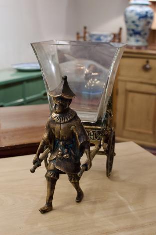 Castilian imports bronze boy pulling cart glass vase