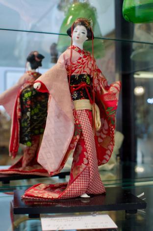 Japanese doll on stand