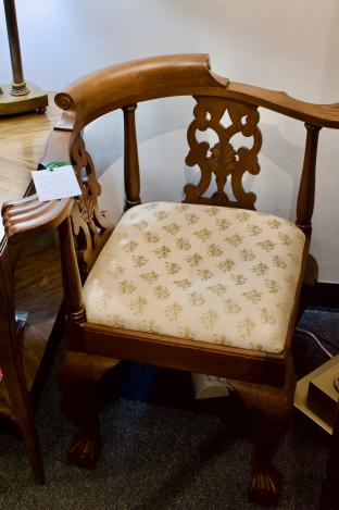 Solid mahogany corner chair w/ carved back