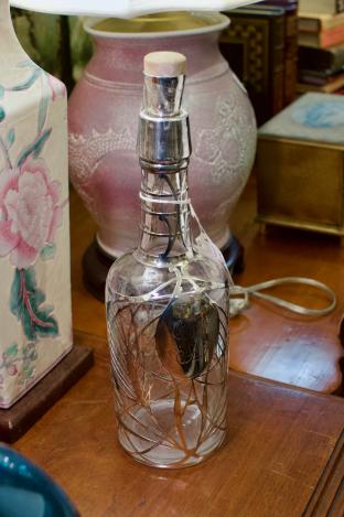 Early sterling overlay liquor bottle