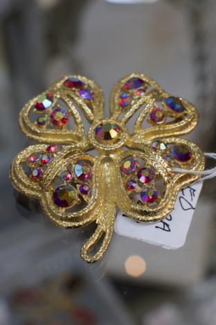 Red aurora borealis rhinestone brooch