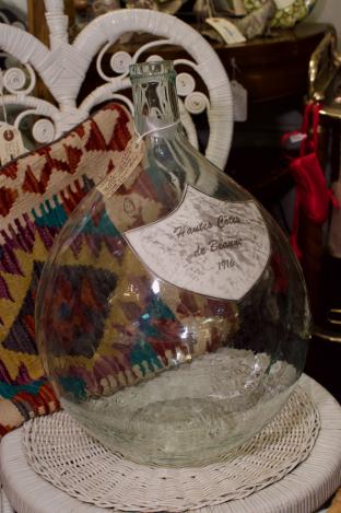 Large clear “bonhomme” French wine bottle