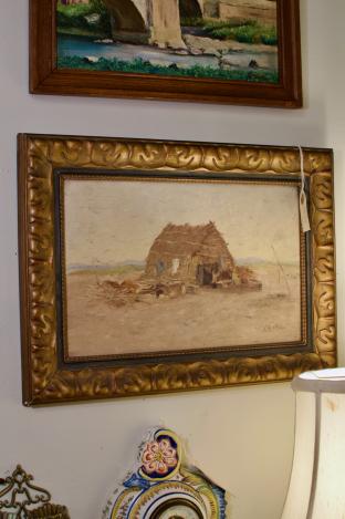 Framed pastoral oil panting - straw hut