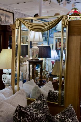 Gold drapery top decorator mirror