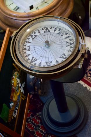 Compass on floor stand