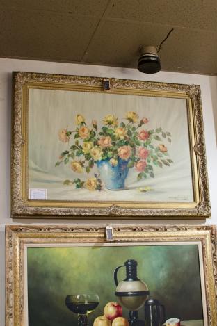 Elegant still life of blue porcelain vase w/ assorted roses