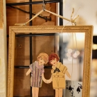 Paper dolls in frame