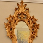 Small gilded ornate mirror