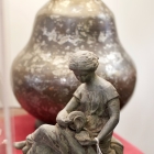 Vintage cast metal lady with jar - statue topper