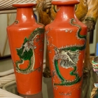 Pair of burnt orange vases w/ dragon motif