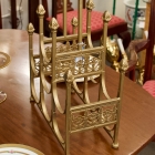 Ornate gold colored wine rack