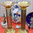Pair of tall brass candle pillars