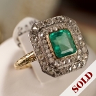 Art deco platinum & 14K gold ring w/ 1.85 CT emerald