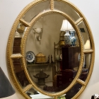 Oval gilt framed mirror.
