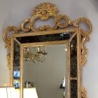 Ornate gilt framed scroll leaf mirror