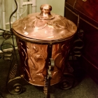 Copper lidded bucket on wrought iron stand