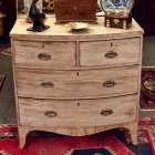 2 over 2 bow front chest of drawers.