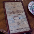 1829 sampler framed for tray