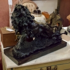 Bronze lion on marble base