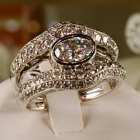 Bezel set oval cut diamond ring