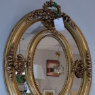 Ornate sectional gold mirror