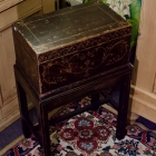 Old painted chest on stand