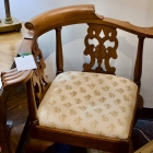 Solid mahogany corner chair w/ carved back