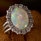 Opal w/ 1CT diamonds ring set in 14K gold