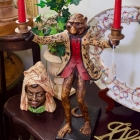Bill Huebbe butler monkey double candle stick