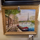 View of the Eiffel Tower along the Seine river