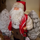 Santa Claus w/ toy & measuring tape
