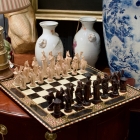 Fine inlaid chessboard w/ hand carved wooden game figures